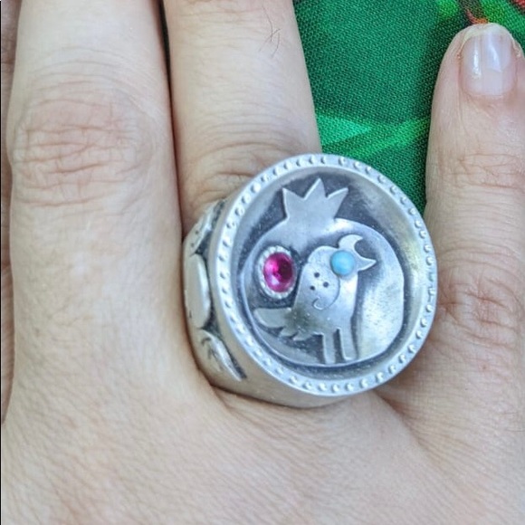 Silver ring with Bird and pomegranate new and size is adjustable